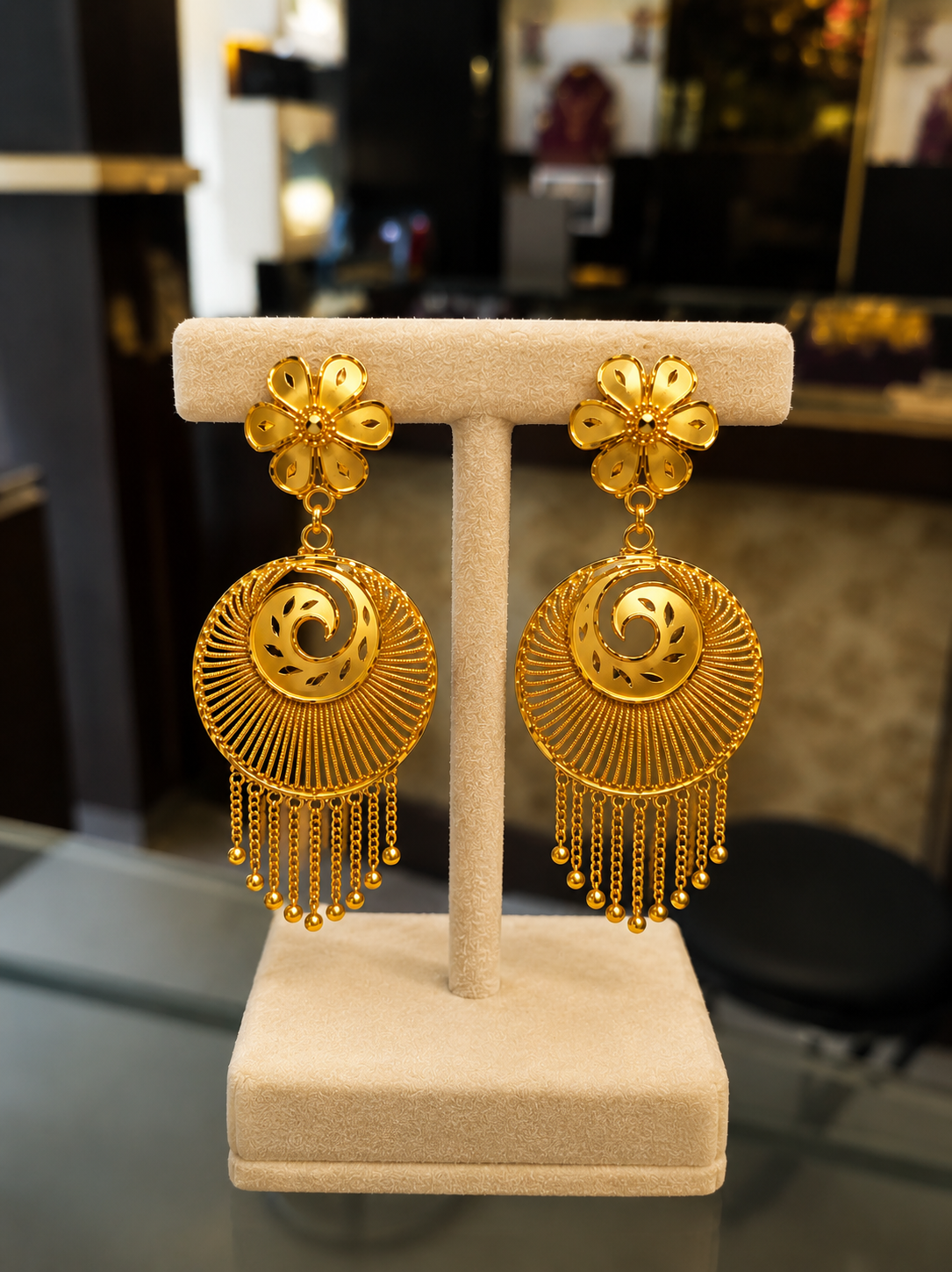 Graceful Ethnic Gold Dangler Design
